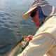 Randy with one of his baby tarpon on fly.