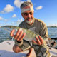 John with his first bonefish on fly.
